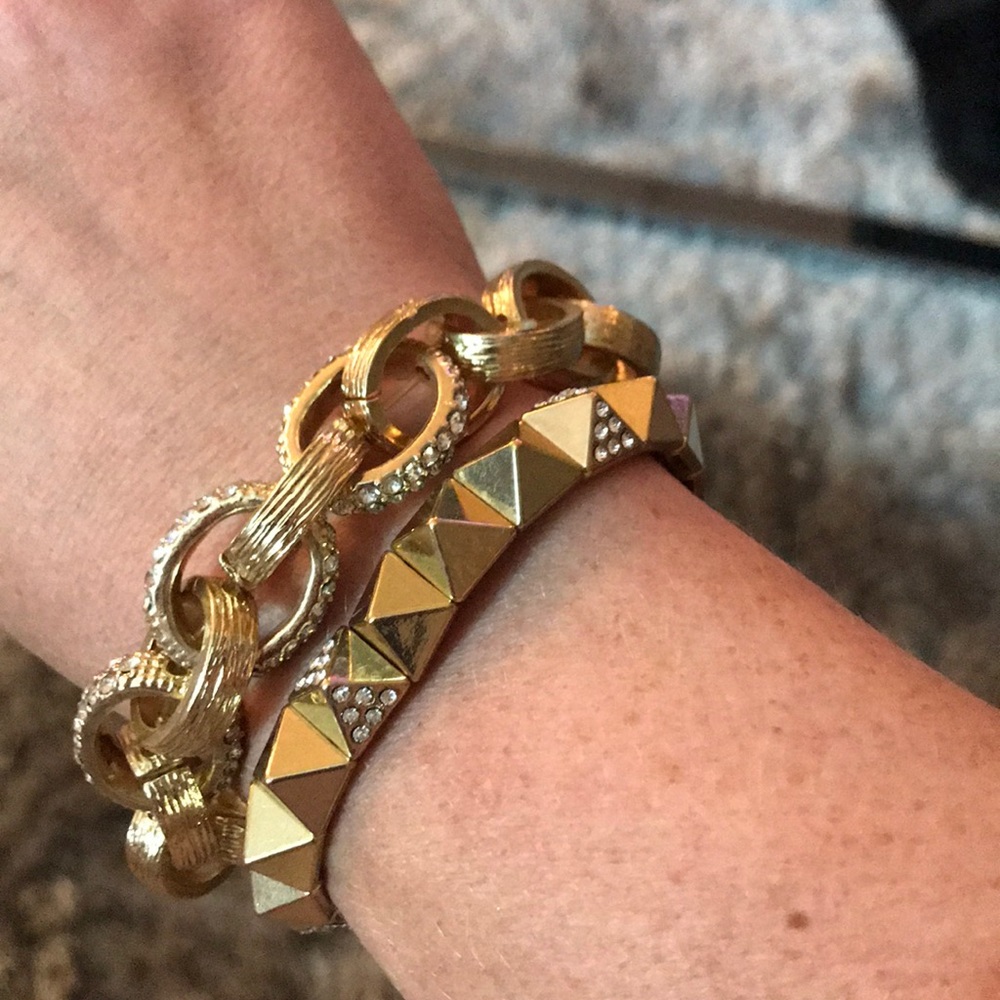 Set of two gold and pave rhinestone bracelets